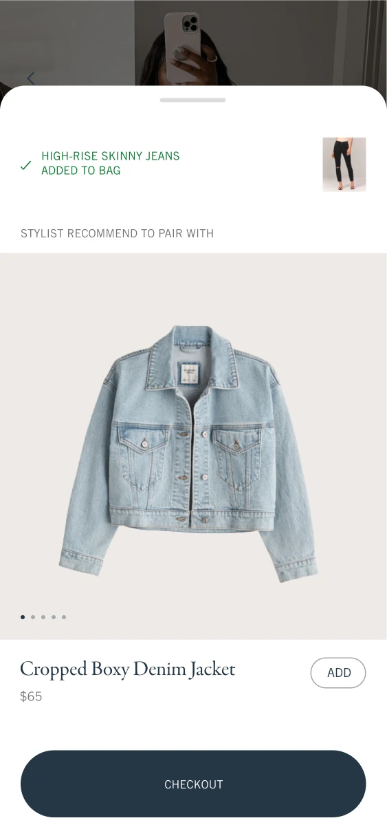 Added-to-bag confirmation above a recommended cropped denim jacket with Add and Checkout controls.