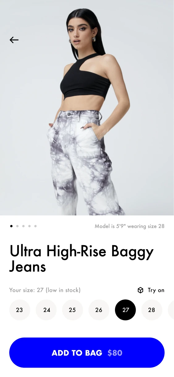 Baggy-jeans product screen with the selected size, a low-stock message, Try On and Add to Bag.
