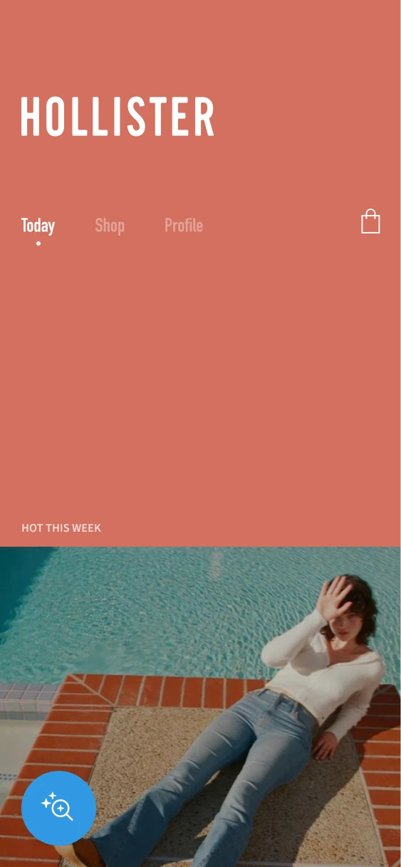 Hollister home screen with coral branding and a flare-denim editorial image.