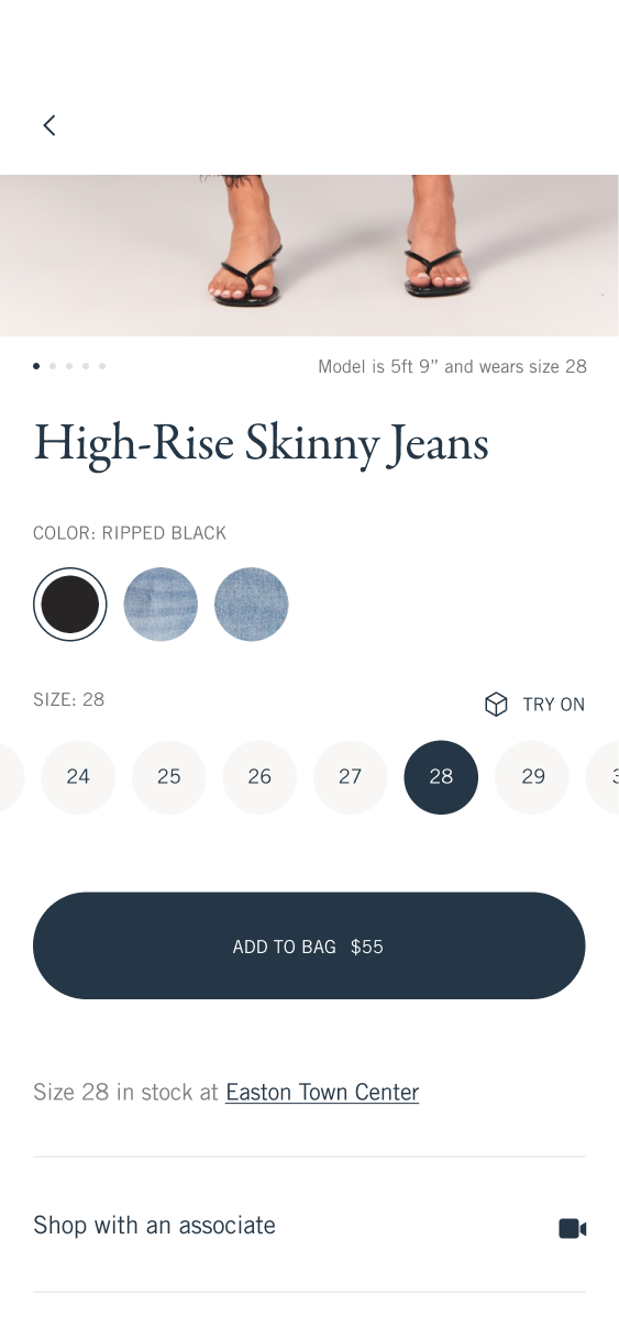 Jeans product details with a size selector, Try On control, store availability and an option to shop with an associate.