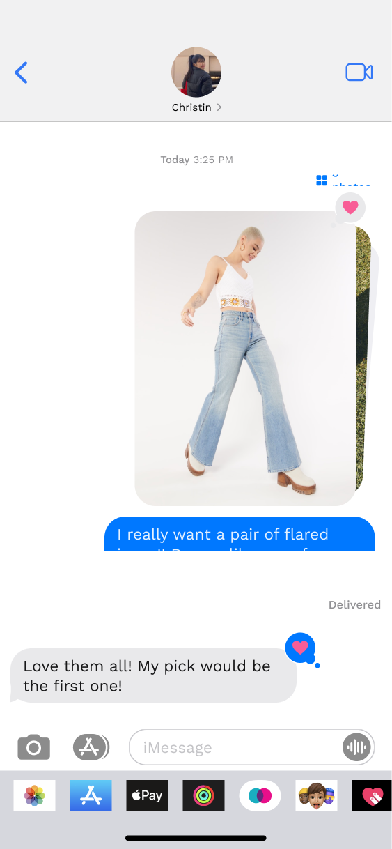 Message conversation containing a shared jeans image and a reply discussing a preferred choice.