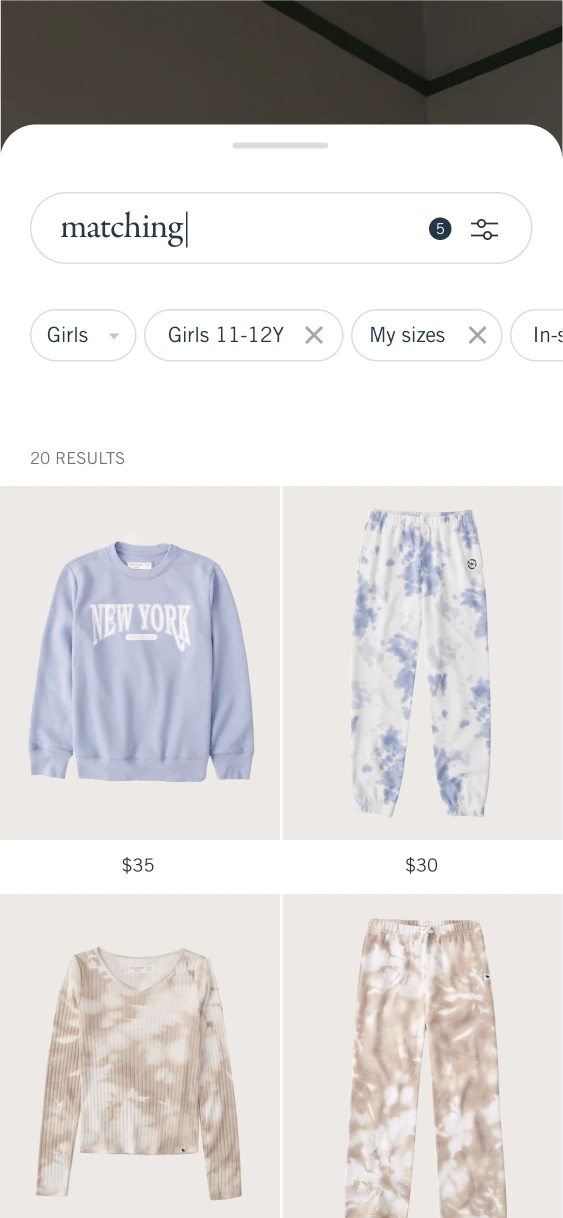 Search results for matching clothing with Girls, age-range and size filter chips.