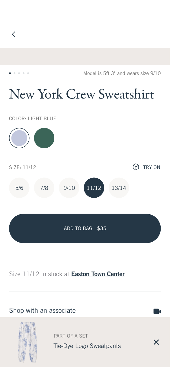 Sweatshirt details showing size selection, Add to Bag, store availability and the matching sweatpants recommendation.