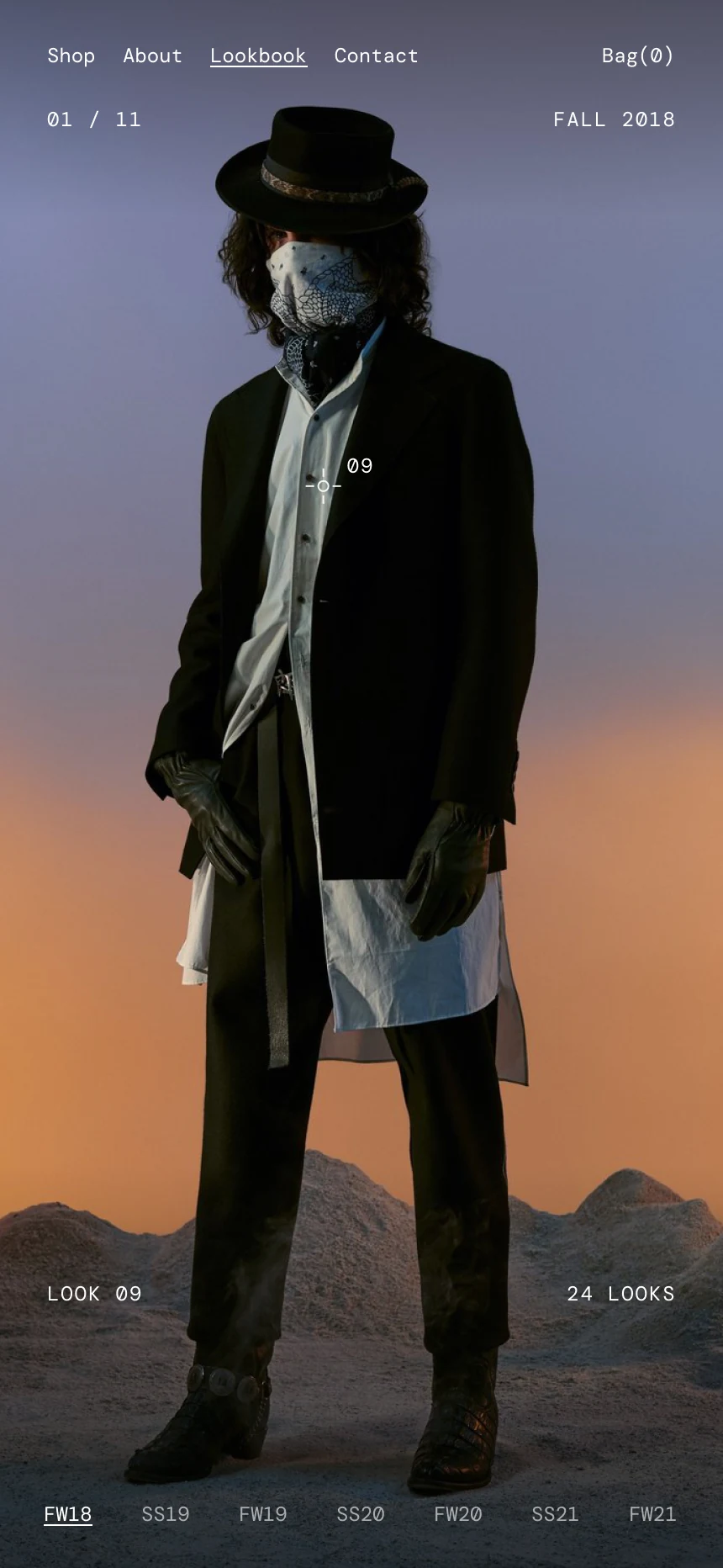 The archive on the phone: Fall 2018 look 9 full bleed, a masked man in a black hat and a long black jacket over a white shirt against the dusk sky. 01 / 11 and Fall 2018 at the top, a mark on his chest numbered 09, Look 09 and 24 looks beside his legs, and the codes along the foot, FW18 underlined.