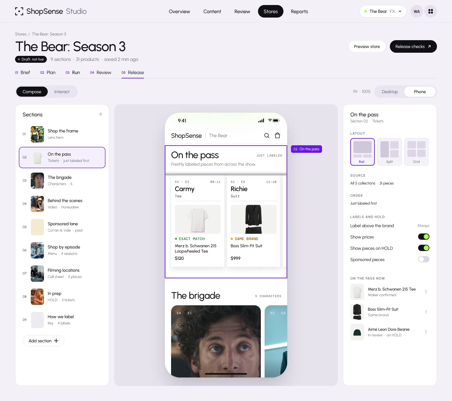 ShopSense Studio store builder: the store’s nine sections, a phone canvas with On the pass selected, and its rules: label above the brand always, prices shown, pieces on HOLD shown, sponsored pieces off. On the pass now: the Merz tee, maker confirmed, which the phone shows as Exact match, the Boss suit as same brand, and the Aimé Leon Dore beanie in review and on HOLD